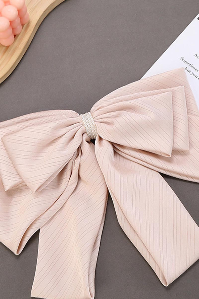 FLIRTY FLUTTER BOW