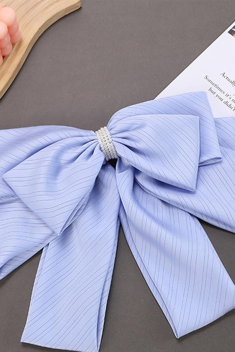 FLIRTY FLUTTER BOW